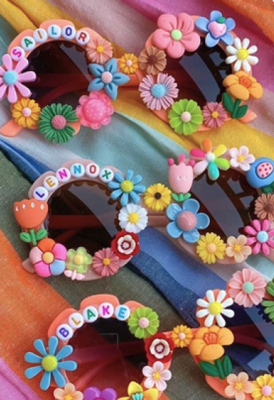 Sunglasses decorated with flowers and name beads