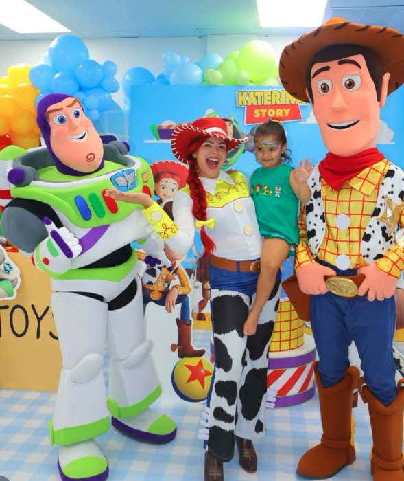 Toy story characters posing with a birthday kid