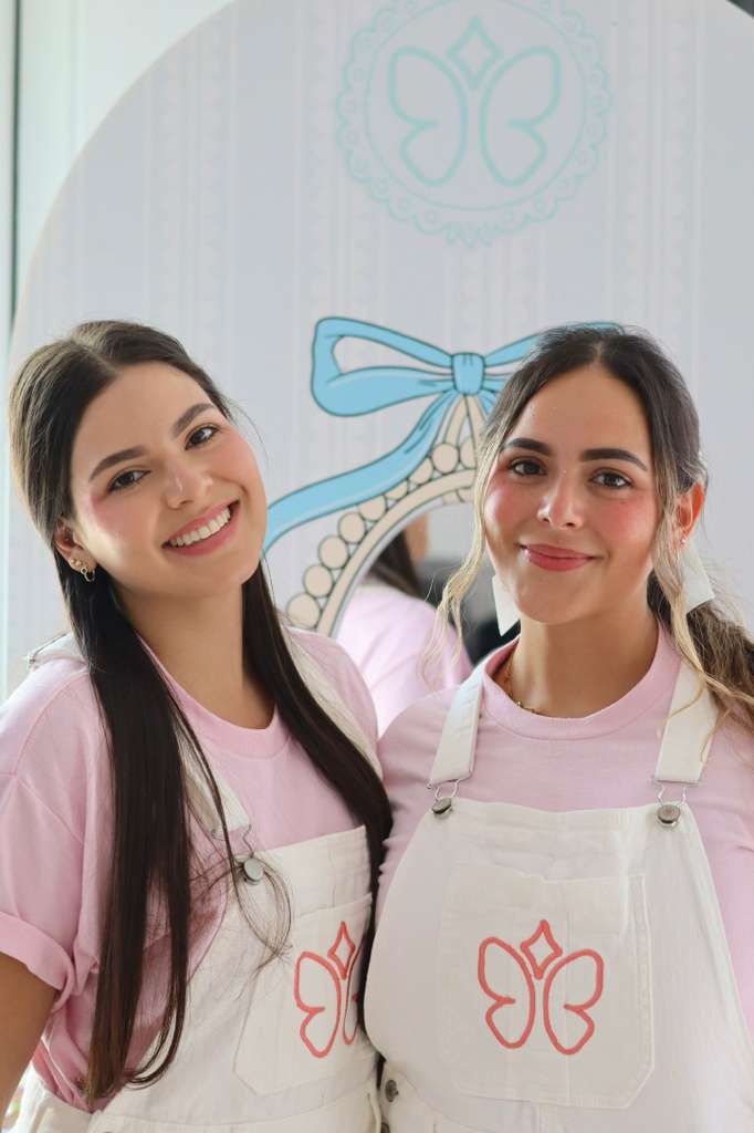 Princess Party To Go creative corner hosts in branded aprons