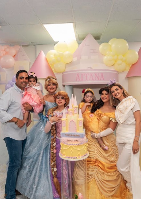 Princess characters with a family at a castle setup