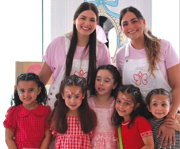 Party artists with a group of face-painted kids