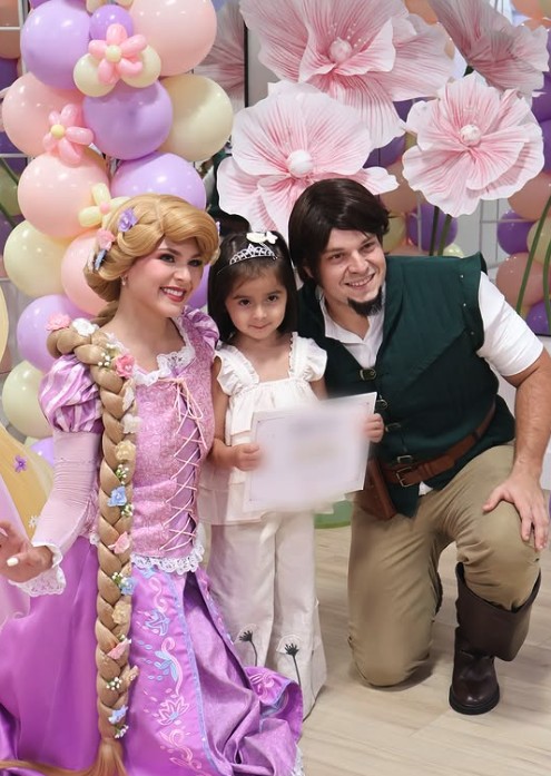 Long haired princess and companion character with a kid