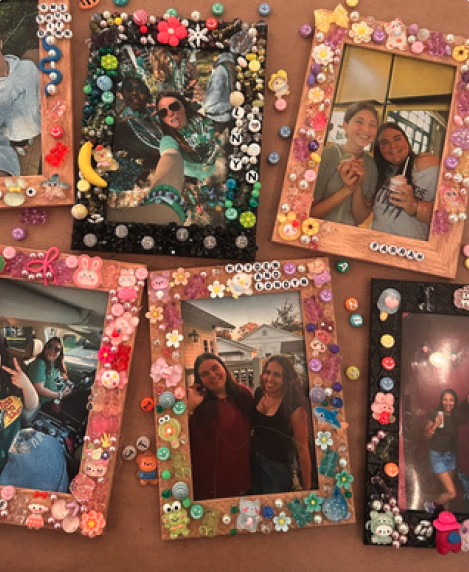 Photo frames decorated with colorful charms and beads
